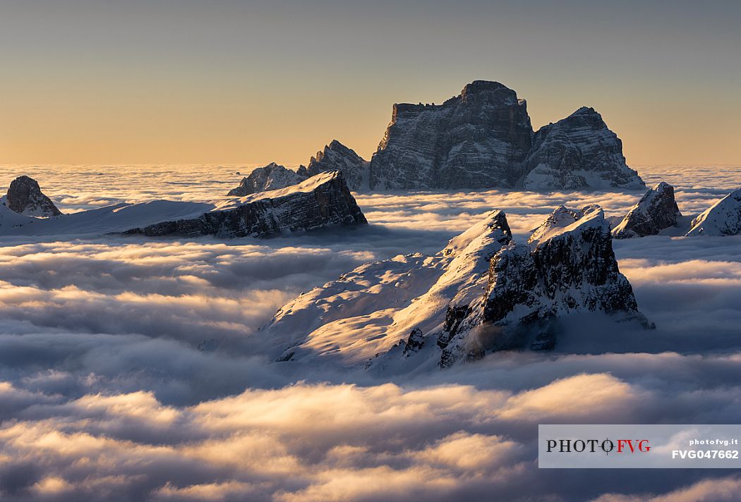 The Pelmo mount and other peaks emerge from the clouds from Lagazuoi summit, Cortina d'Ampezzo, dolomites, Italy, Europe

.
